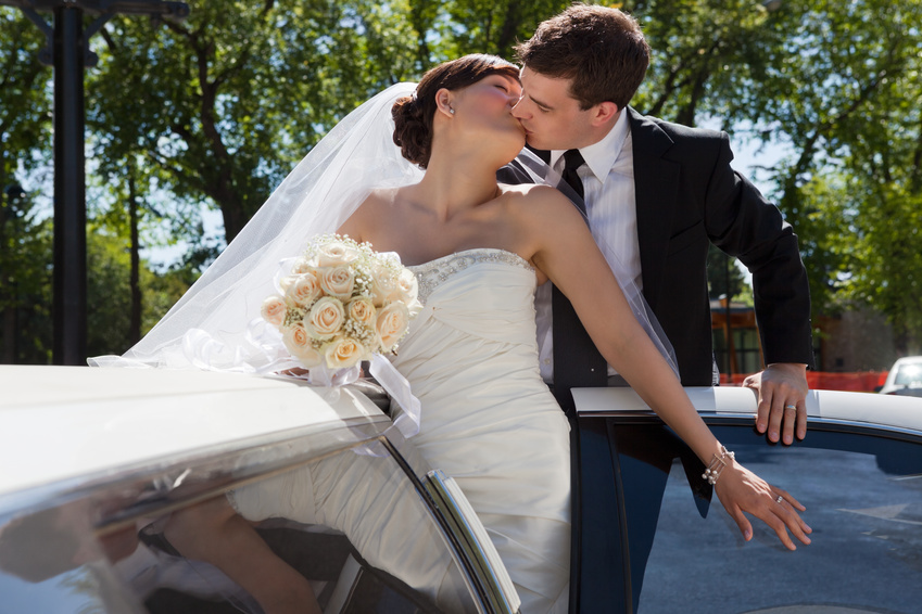 Cute couple kissing in limousine